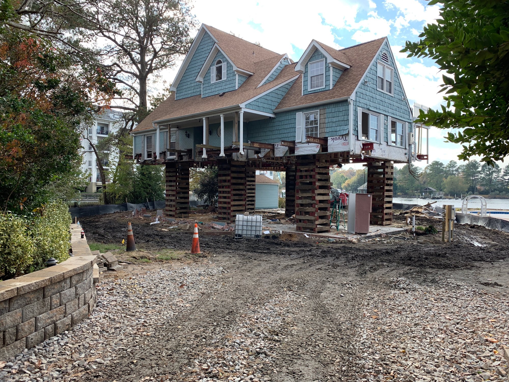 elevated house that suffered from flood damage