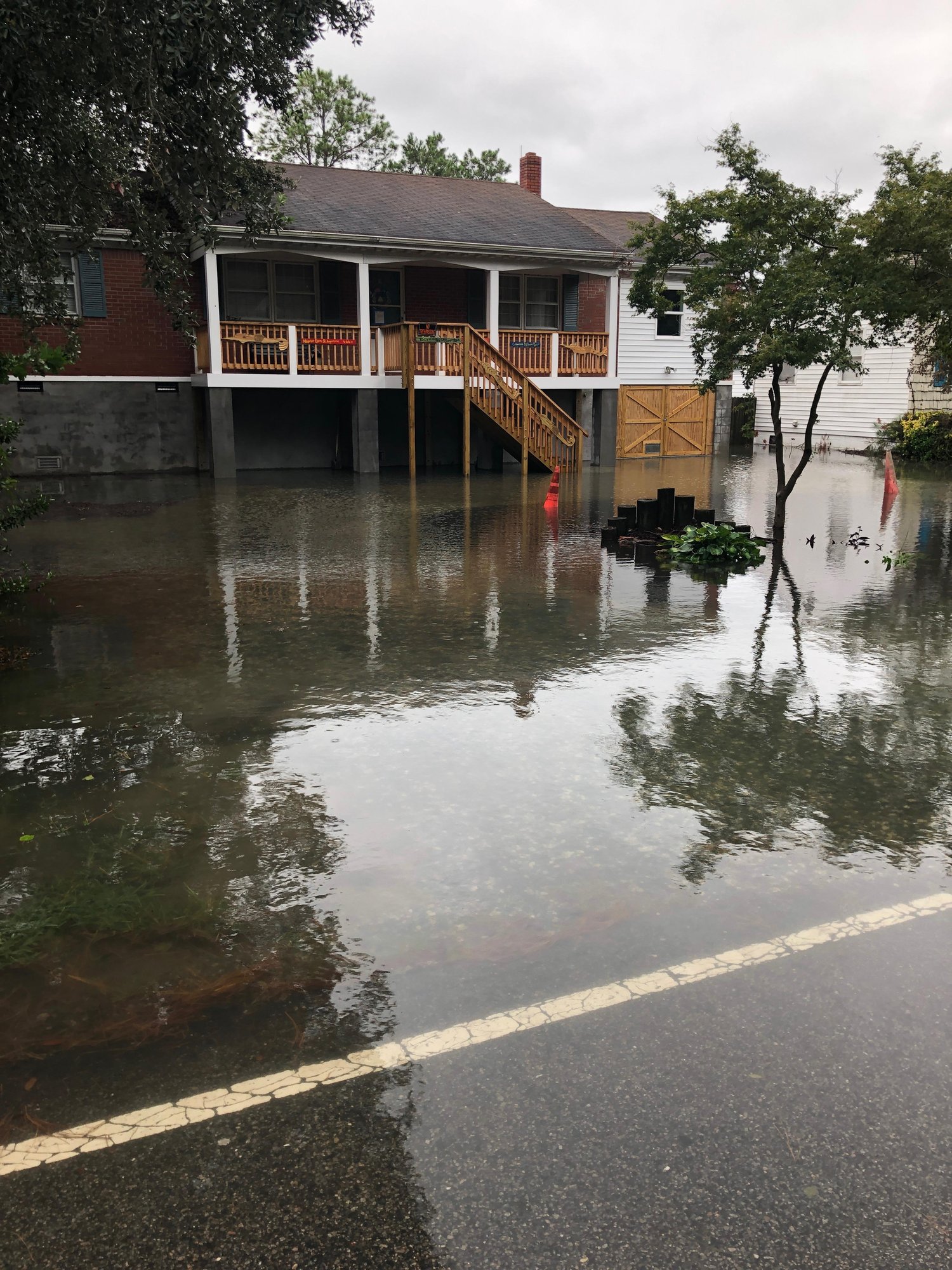 house in danger of flood damage