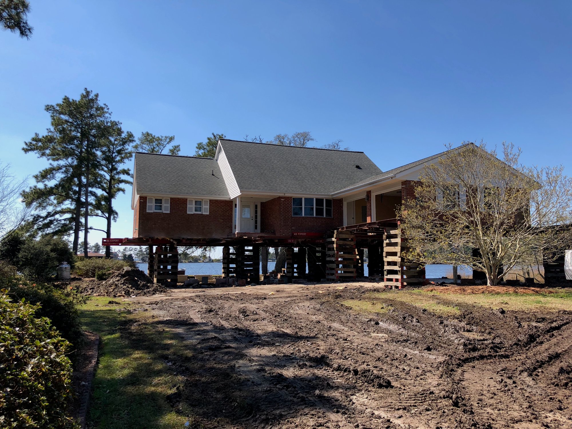 house near water in flood danger